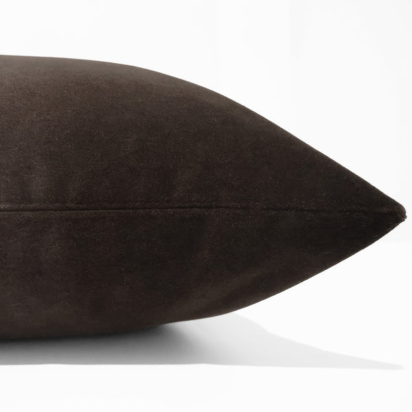 Espresso velvet pillow cover with soft matte finish, front corner detail
