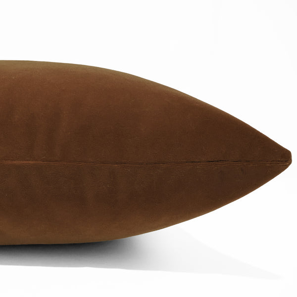 Nutmeg velvet pillow cover with smooth matte finish, front corner detail