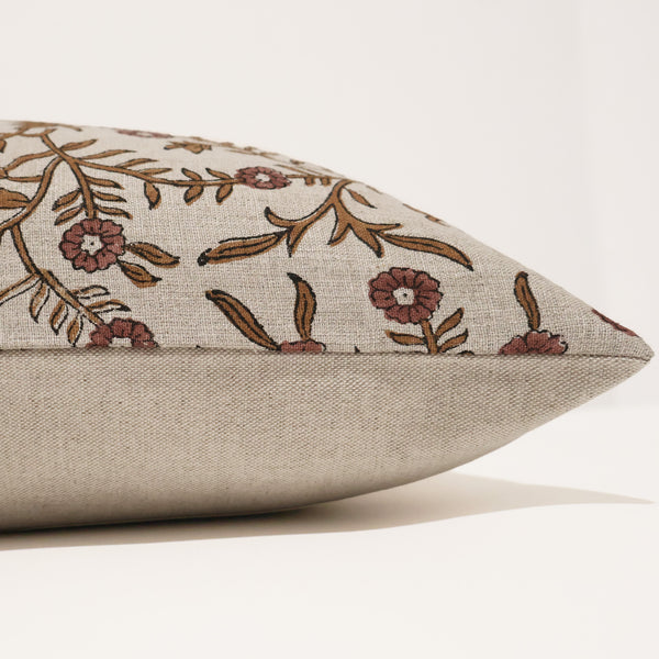 Autumn Vine Linen Block Print Pillow Cover featuring hand block printed rust and brown trailing floral vines on natural 100% linen, handmade by Hackner Home. Side view of cushion cover.