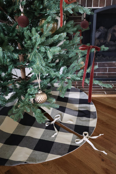 Handmade black and warm white buffalo plaid Christmas tree skirt in 100% cotton by HACKNER HOME