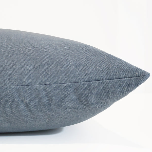Washed Cotton Sky Pillow Cover in soft blue woven upholstery fabric, handmade by Hackner Home for coastal, modern organic, and transitional interiors. Side View of Cushion Cover.