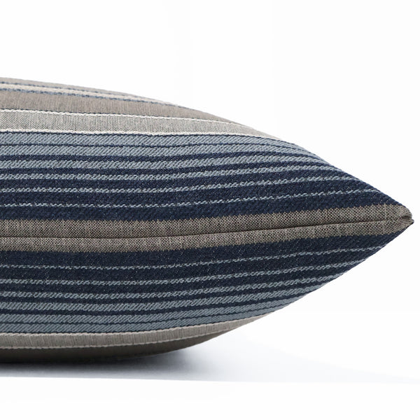 Side view of the Sailcloth Stripe Pillow Cover, showing the textured navy and taupe stripe pattern.