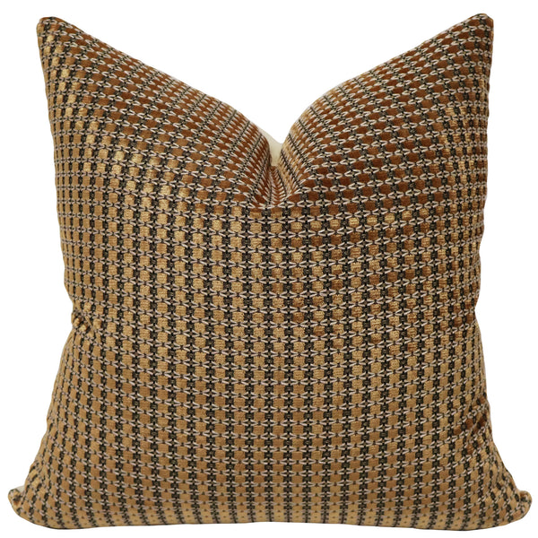 A square decorative throw pillow with a textured geometric pattern in brown, beige, and black, shown against a plain white background.