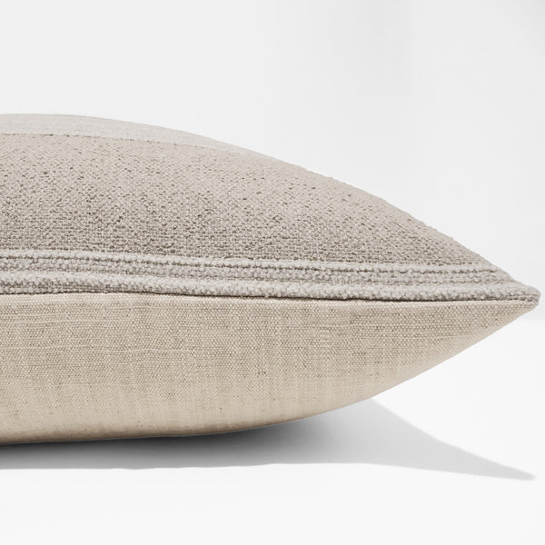 Ivory Ridge Stripe Pillow Cover in warm beige upholstery fabric with raised ivory stripe detailing, handmade by Hackner Home for modern organic and coastal interiors. Side view of Cushion Cover. 