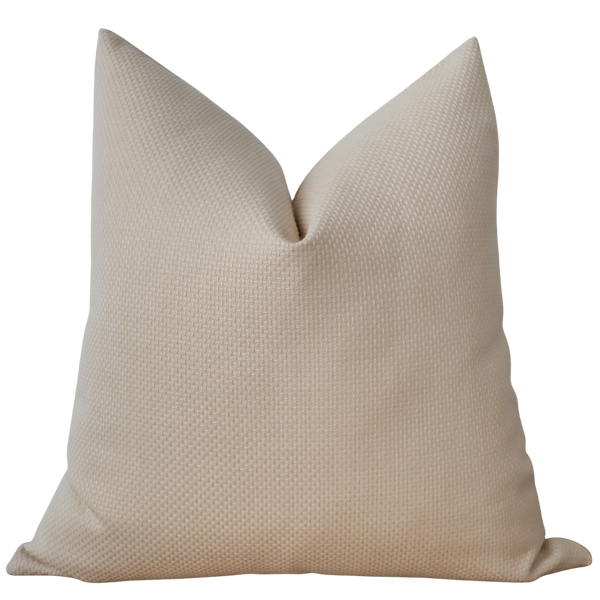 Sunlit Weave Indoor/Outdoor Pillow Cover in warm cream-gold woven Sunbrella® fabric, handmade by Hackner Home for coastal and transitional interiors.