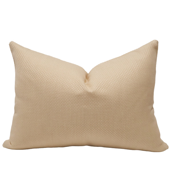 Sunlit Weave Indoor/Outdoor Lumbar Pillow Cover in warm cream-gold Sunbrella performance fabric with a textured woven finish, handmade by Hackner Home for luxury indoor and outdoor living.