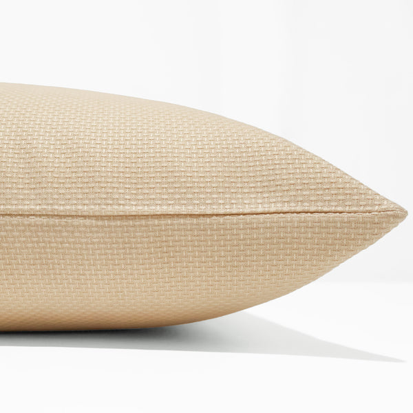 Sunlit Weave Indoor/Outdoor Pillow Cover in warm cream-gold Sunbrella performance fabric with a textured woven finish, handmade by Hackner Home for luxury indoor and outdoor living. Side View of Cushion cover.