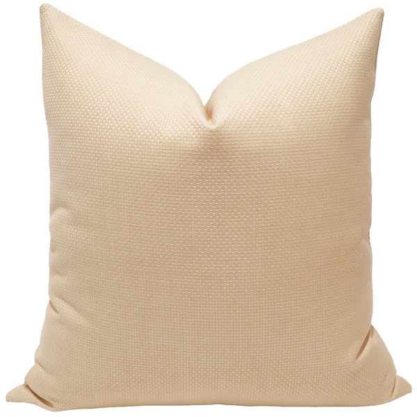 Sunlit Weave Indoor/Outdoor Pillow Cover in warm cream-gold Sunbrella performance fabric with a textured woven finish, handmade by Hackner Home for luxury indoor and outdoor living.