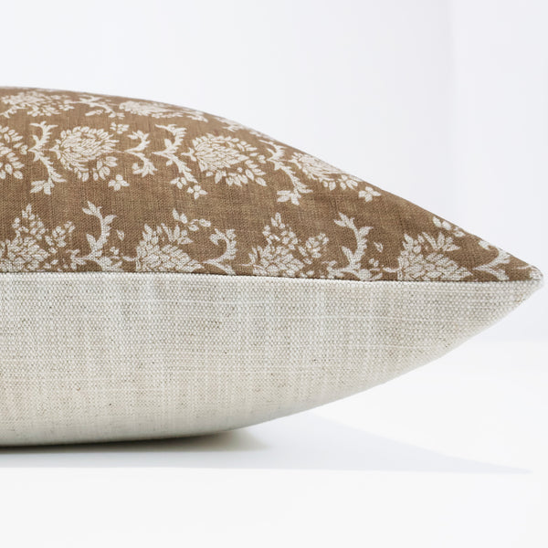 Thistle Meadow Linen Pillow Cover featuring hand block printed ivory floral motifs on warm oat-brown 100% linen, handmade by Hackner Home. Side view of cushion cover.