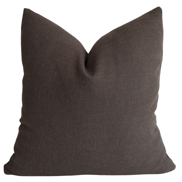 A dark walnut brown pillow cover with a natural texture displayed on a neutral background.