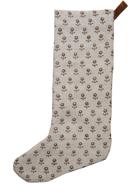 Large linen Christmas stocking with a minimalist brown floral block print pattern and a brown velvet hanging loop, displayed on a plain background.