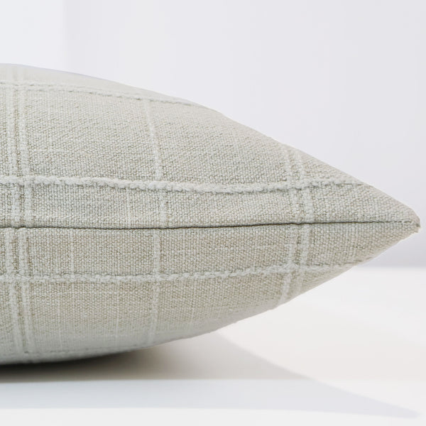 Hackner Home Sable Check Pillow Cover in a soft neutral cream tone featuring a subtle textured grid pattern, shown in a lumbar size for a modern minimal look.