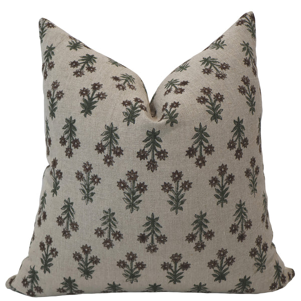 Hackner Home Wood Lily block print pillow cover featuring a hand-printed floral pattern in earthy green and brown tones on a natural linen fabric.